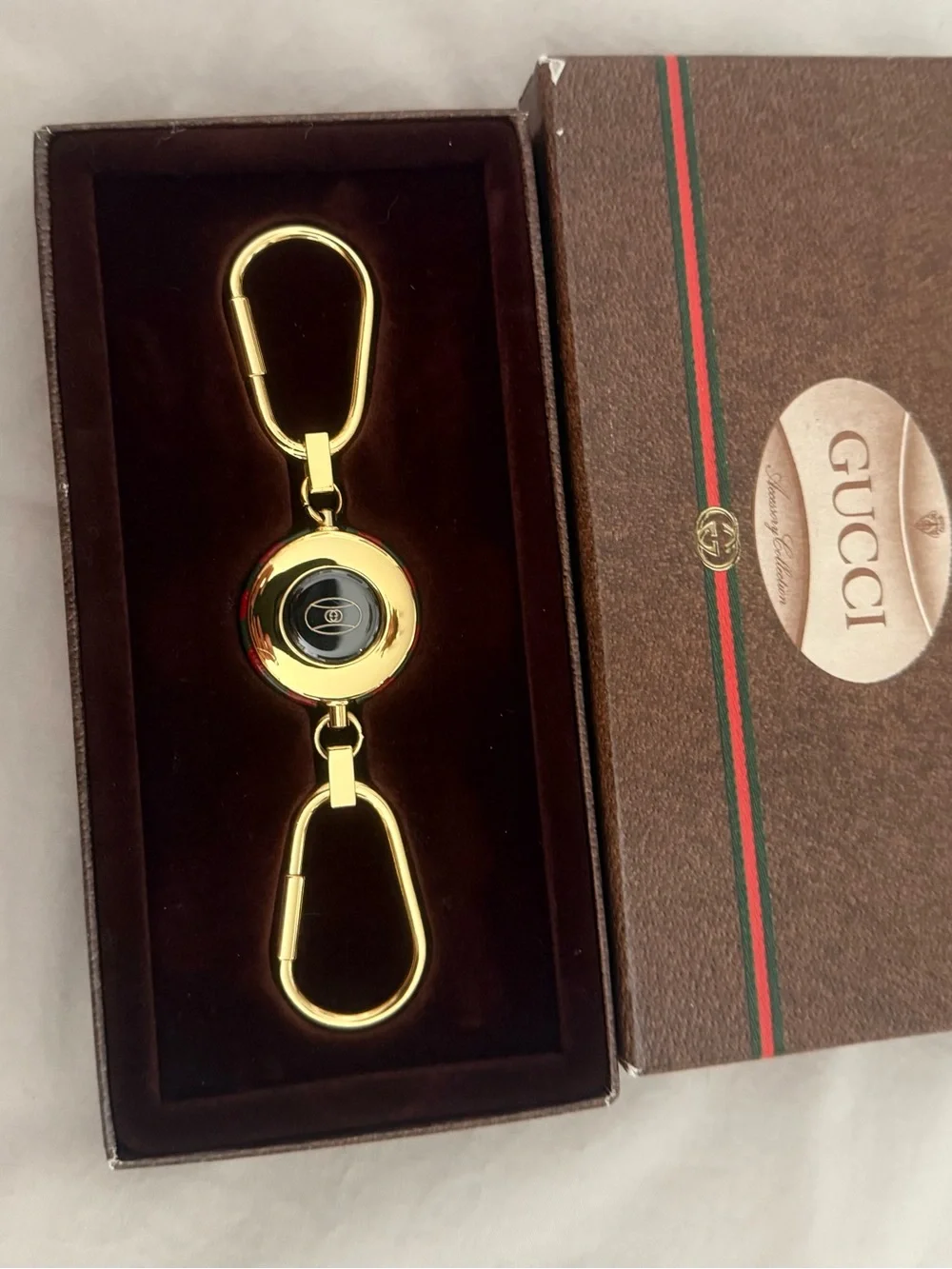 Gucci Gold Double Clip Key Holder with Black Center Accent
